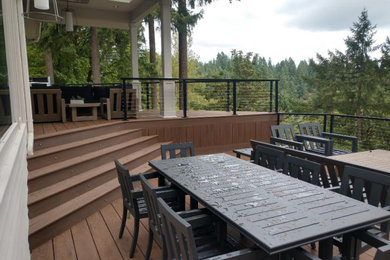 Deck - huge craftsman backyard deck idea in Portland