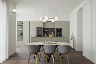 Immagine di una grande cucina minimalista con lavello a vasca singola, paraspruzzi nero, paraspruzzi in gres porcellanato, elettrodomestici neri, parquet scuro e top nero