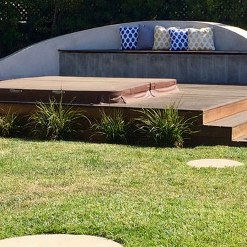 Large modern spa set below grade with Mangaris deck surrounds.