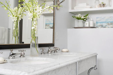 Trendy white tile and stone tile doorless shower photo in Los Angeles with an undermount sink, marble countertops, an undermount tub, open cabinets and white cabinets