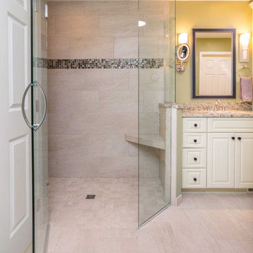 Traditional Primary Bath With a White Vanity Tower and Curbless Shower