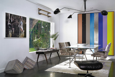 Example of a trendy dining room design in Miami