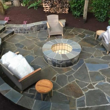 Irregular Pennsylvania Flagstone Circular Patio with Sitting Wall and Fire Pit