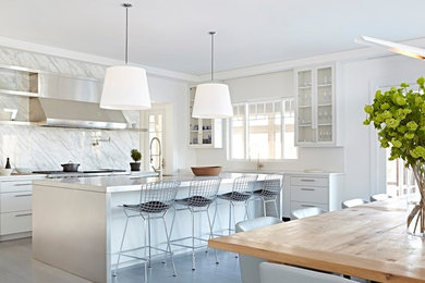 Large trendy open concept gray floor living room photo in New York with white walls
