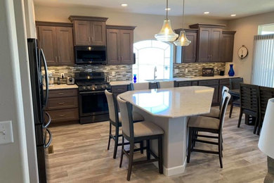 Kitchen - transitional kitchen idea in Other