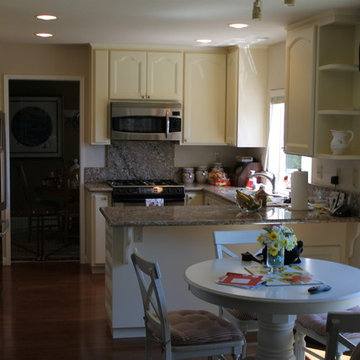 Refaced Cabinets with Wilmington Door in Buttercream.
