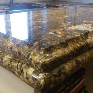 Carnaval Granite on White Cabinets