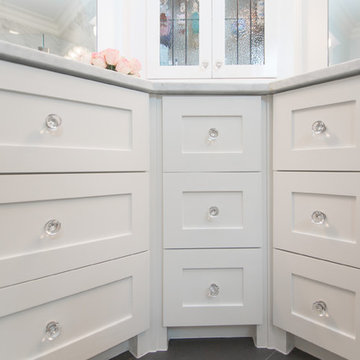 Bathroom | Elegant Custom Cabinets | Marble Tile & Freestanding Tub