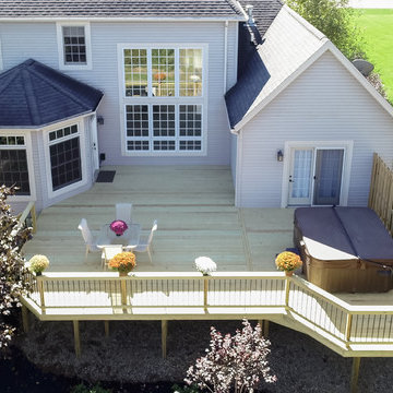 Deck and Unilock Paver Patio with Firepit & Landscaping