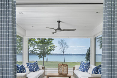 Example of a beach style sunroom design in Detroit