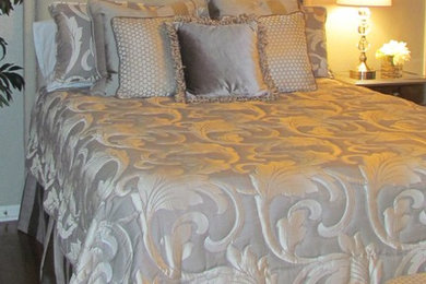 Example of a large trendy dark wood floor bedroom design in Austin with gray walls and no fireplace