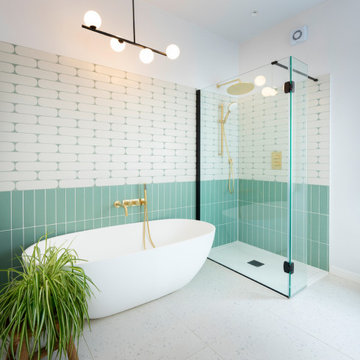 Contemporary, colourful renovation including bespoke kitchen and sage/brass bath