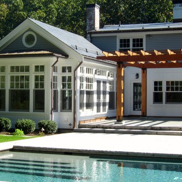 Sunroom addition and pergola
