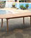 11-Piece Outdoor Teak Dining Set, 117" Extension Oval Table, 10 Giva Arm Chairs