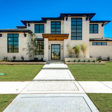 Contemporary with Stone Exteriors