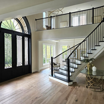 Project #130 | Curved Staircase with Wraparound Balcony