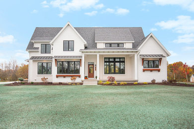 Inspiration for a country exterior home remodel in Grand Rapids