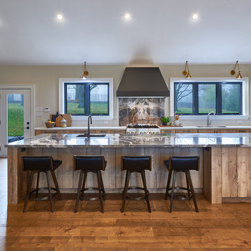 15 ft. island, bookmatched character Quartzite countertops & backsplash