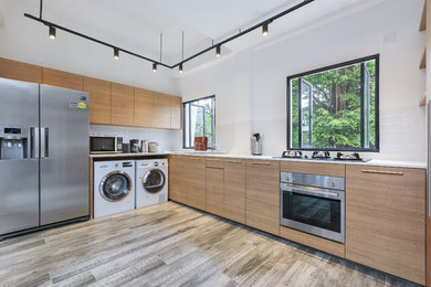 Inspiration for a contemporary kitchen remodel in Singapore