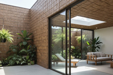 Patio - large patio idea in Toronto