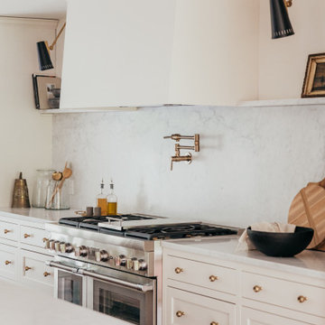 Lakeside Estates Modern Transitional Kitchen Utilizes White Paint with White Oak