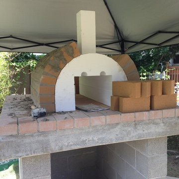 The Castillo Family Wood Fired Pizza Oven & La Caja Style Pig Roaster in WA