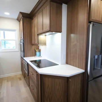 Rich & Refined: Custom Walnut Kitchen Remodel with White Quartz & Oak Flooring
