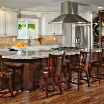 Medium kitchen remodel with washer and dryer in kitchen