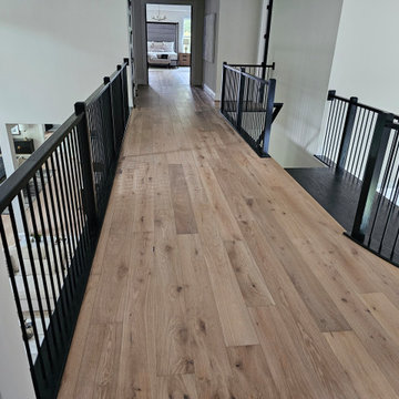 Project #130 | Curved Staircase with Wraparound Balcony