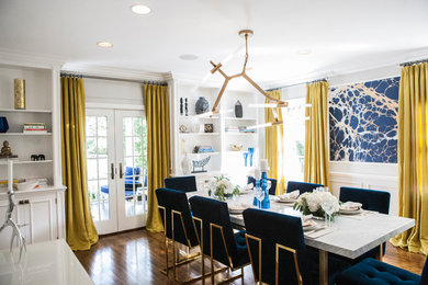 Mid-sized trendy medium tone wood floor and brown floor enclosed dining room photo in New York with gray walls and no fireplace