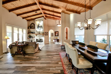 Inspiration for a mid-sized rustic formal and open concept porcelain tile and brown floor living room remodel in Miami with brown walls, a standard fireplace, a tile fireplace and no tv