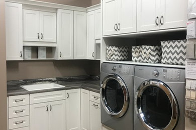 WHITE CABIENTS IN LAUNDRY ROOM