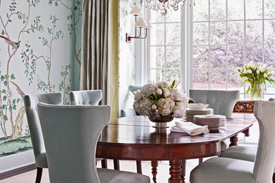 Large transitional dark wood floor enclosed dining room photo in Charlotte with green walls