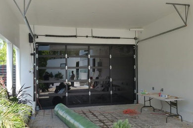 Modern Black Anodized Aluminum & Black Laminate Glass Garage Doors