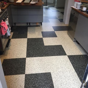Installing Marmoleum Artoleum in a Black & White Pattern to Hall