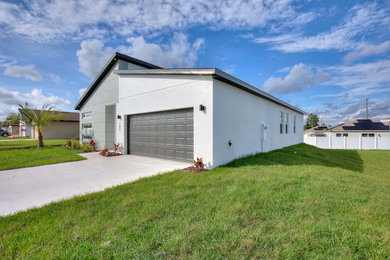 Example of a 1960s garage design in Other