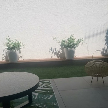 Un véritable espace détente, cosy, un jardin épuré... dans 24m2!