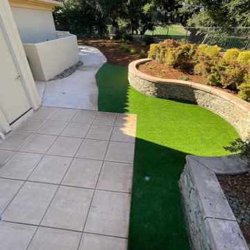 Synthetic turf , mulch ,plant and drip installation