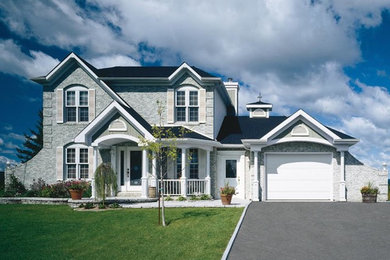 Inspiration for a mid-sized timeless attached one-car garage remodel in Cedar Rapids