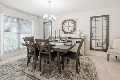 Beach style dining room photo in Orlando