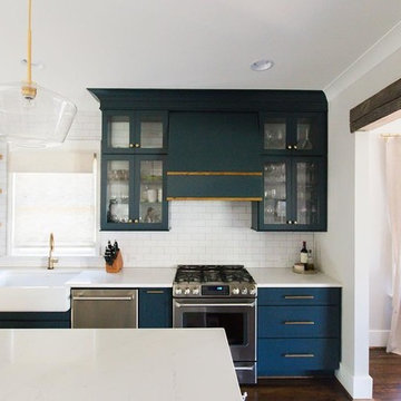 Calcutta Gold Quartz Kitchen with Blue Cabinets