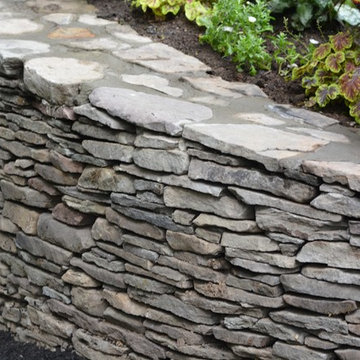 Pond with Bluestone Patio and Pennsylvania Flat Wall