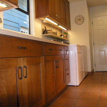 Sally's Custom Cherry Laundry Room with Hand Made Custom Tile