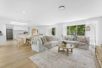 Photo of a beach style living room in Gold Coast - Tweed.