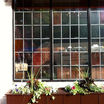 Custom built planters filled with professionaly planted flowers by Todd Nappi of