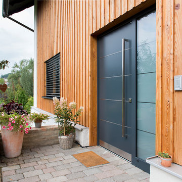 Holzfassade trifft Aluminium
