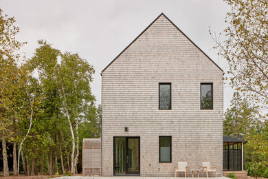 Example of a danish exterior home design in Toronto