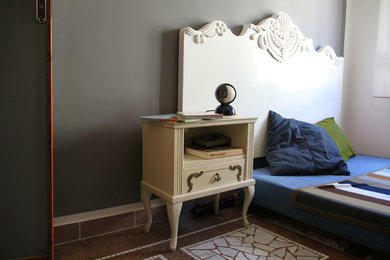 Example of an eclectic bedroom design in Florence