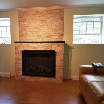 Napoleon Electric Fireplace Finished to compete the Family Room