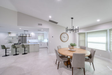 Dining room - transitional dining room idea in Miami